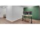 Minimalist office area featuring hardwood floors, desk, and storage at 1674 Executive Park Ne Ln, Atlanta, GA 30329