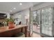 Bright living room with french doors opening to a backyard patio and outdoor furniture set at 1674 Executive Park Ne Ln, Atlanta, GA 30329