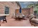 Outdoor patio with a dining set, grill, and brick walls at 1674 Executive Park Ne Ln, Atlanta, GA 30329
