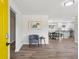 Inviting Foyer view to the kitchen and dining area featuring contemporary design and hardwood floors at 2519 Miriam Ln, Decatur, GA 30032