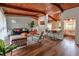 Bright open-concept living room with wood floors, stylish decor, and a cozy breakfast bar at 3348 Lynnray Dr, Atlanta, GA 30340