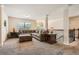 Open living room featuring carpet flooring, comfortable furniture, and natural light at 349 Pennant Ln, Fairburn, GA 30213