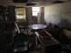 Basement area with furniture, clutter, and poor lighting at 5804 S South Gordon Sw Rd, Austell, GA 30168