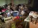 Storage area in basement full of clutter, furniture, and various items at 5804 S South Gordon Sw Rd, Austell, GA 30168