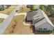 Aerial view of home with long driveway, manicured lawn, and mature trees at 20 Saddle Wood Dr, Dallas, GA 30157