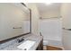 Bathroom featuring granite countertops, a large mirror, and a shower-tub combo at 20 Saddle Wood Dr, Dallas, GA 30157