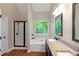 Bathroom featuring double vanity, granite countertop, soaking tub and tiled shower at 20 Saddle Wood Dr, Dallas, GA 30157