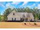 Charming single-Gathering home features a well-maintained front yard and classic architectural details at 20 Saddle Wood Dr, Dallas, GA 30157