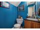 Stylish bathroom with a toilet, sink, and granite countertop at 30 Crestfield Cir, Covington, GA 30016