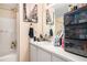 Bright bathroom with a tub and vanity at 30 Crestfield Cir, Covington, GA 30016