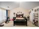 Spacious bedroom with a bed and carpeted floors at 30 Crestfield Cir, Covington, GA 30016