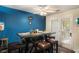 Cozy dining area featuring a rustic table, stylish seating, and access to the outdoor patio at 30 Crestfield Cir, Covington, GA 30016