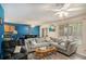 Open-concept living room that combines a cozy seating area with a dining space at 30 Crestfield Cir, Covington, GA 30016