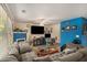 Cozy living room with a comfortable sofa, fireplace, and modern entertainment setup at 30 Crestfield Cir, Covington, GA 30016