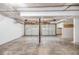 Spacious two-car garage with concrete floor and white garage doors at 314 Sable Trace Pass, Acworth, GA 30102