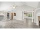 Bright living room featuring a cathedral ceiling, fireplace, and luxury vinyl flooring at 314 Sable Trace Pass, Acworth, GA 30102