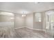 Spacious living room featuring wood flooring and decorative archways leading to other rooms at 314 Sable Trace Pass, Acworth, GA 30102