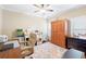 Well-lit home office featuring a desk, computer, ample storage, and a neutral-toned rug at 3541 Haddon Hall Dr, Buford, GA 30519