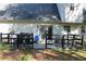 Fenced backyard with a patio, grill and seating at 4314 Saddlecreek Ct, Auburn, GA 30011