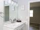 Bathroom with a marble countertop, modern fixtures, and soft lighting at 4314 Saddlecreek Ct, Auburn, GA 30011