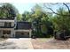 View of the home's front and two-car garage at 4314 Saddlecreek Ct, Auburn, GA 30011