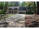Charming two-story home with a two-car garage and a basketball hoop at 4314 Saddlecreek Ct, Auburn, GA 30011