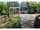 Charming two-story home featuring a two-car garage and well manicured lawn at 4314 Saddlecreek Ct, Auburn, GA 30011