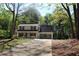 Charming two-story home with a two-car garage and mature shade trees at 4314 Saddlecreek Ct, Auburn, GA 30011