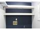 Bare laundry room with navy walls and updated floor at 4314 Saddlecreek Ct, Auburn, GA 30011