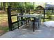 Back patio featuring a metal table and chairs and fenced perimeter at 4314 Saddlecreek Ct, Auburn, GA 30011