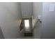 Stairway leading to a door with grey walls and white stairs and railings at 4314 Saddlecreek Ct, Auburn, GA 30011