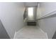 Stairway leading to a door with grey walls and white stairs and railings at 4314 Saddlecreek Ct, Auburn, GA 30011