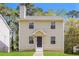 Charming two-story home with a cozy front porch and well-maintained lawn at 5228 Kirk Dr, Atlanta, GA 30349