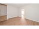 Open-concept living area with wood floors and easy access to other rooms at 5228 Kirk Dr, Atlanta, GA 30349