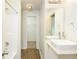 Updated bathroom featuring modern sink vanity, mirror, fixtures and shower with a neutral color scheme at 809 Brickleridge Se Ln, Mableton, GA 30126