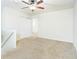 Spacious carpeted bedroom with a ceiling fan and double door closet at 809 Brickleridge Se Ln, Mableton, GA 30126