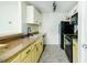 Functional kitchen with appliances, granite countertops, and neutral color scheme at 809 Brickleridge Se Ln, Mableton, GA 30126
