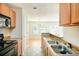 Kitchen with granite countertops and stainless steel sink overlooks breakfast area at 809 Brickleridge Se Ln, Mableton, GA 30126