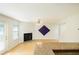 Bright living room with fireplace and access to the outdoor patio at 809 Brickleridge Se Ln, Mableton, GA 30126