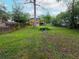 Large backyard featuring mature trees and plenty of green space to enjoy outdoor living at 2129 Fairhaven Ne Cir, Atlanta, GA 30305