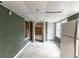 Basement featuring storage closet, shelving, and refrigerator at 2129 Fairhaven Ne Cir, Atlanta, GA 30305