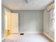 Bedroom featuring neutral walls, white trim, carpet, window, and a ceiling fan at 2129 Fairhaven Ne Cir, Atlanta, GA 30305