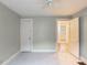 Bedroom featuring neutral walls, white trim, carpet, and a ceiling fan at 2129 Fairhaven Ne Cir, Atlanta, GA 30305