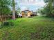View of the backyard and home featuring an elevated deck from the second story at 2129 Fairhaven Ne Cir, Atlanta, GA 30305