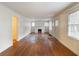 Spacious living room with hardwood floors, a fireplace, and ample natural light at 2129 Fairhaven Ne Cir, Atlanta, GA 30305