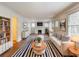 Bright living room featuring a fireplace, hardwood floors, and modern furniture arrangement at 2129 Fairhaven Ne Cir, Atlanta, GA 30305