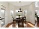 Sunny breakfast nook with views of trees and updated lighting at 2275 Barrett Dr, Cumming, GA 30040