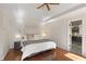 Relaxing main bedroom featuring hardwood floors and tray ceiling at 2275 Barrett Dr, Cumming, GA 30040