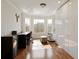 Bright office with large windows, hardwood floors, and updated lighting at 2275 Barrett Dr, Cumming, GA 30040