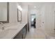 Bathroom with dual sinks, vanity, and ample counter space at 306 Atley Pl, Alpharetta, GA 30009